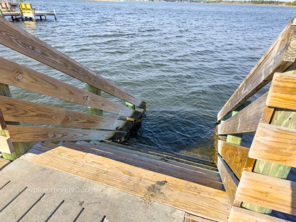 Stairs into the water at the end of the pier