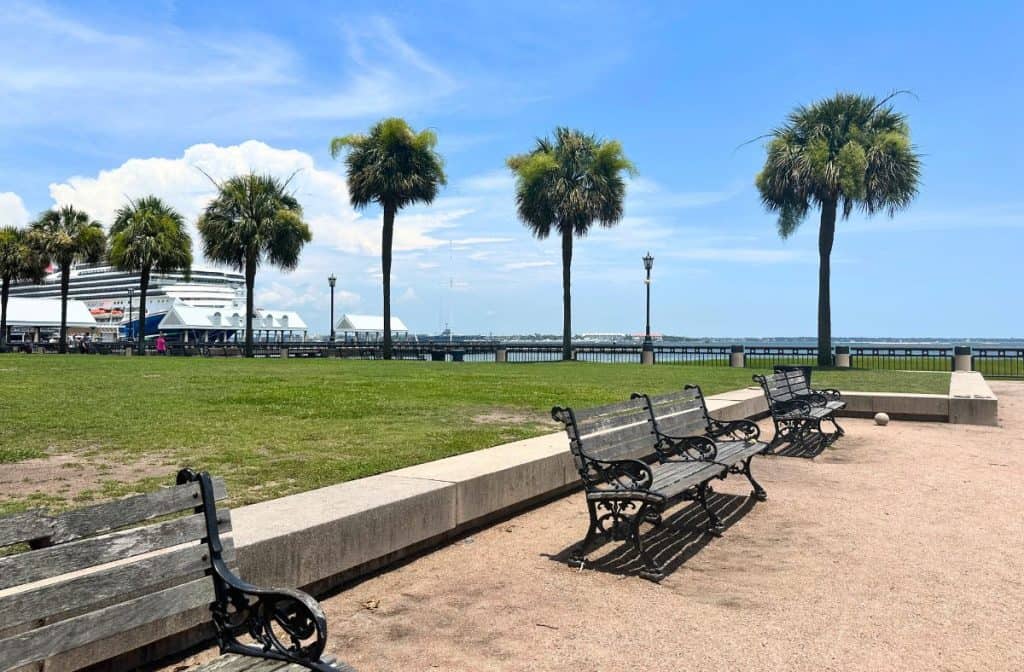 Waterview with benches at Joe Riley Waterfront Park with a cruise ship in the background