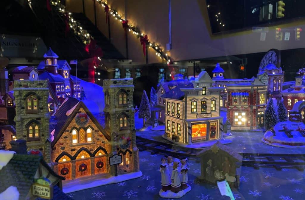 A festive miniature Christmas village display at the Classic Christmas event in Mooresville, NC.