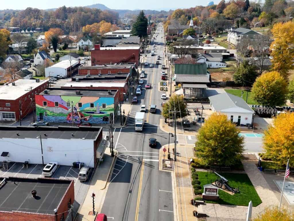 Colorful downtown Wilkesboro NC street with autumn trees. Wilkes County NC Travel Guide.